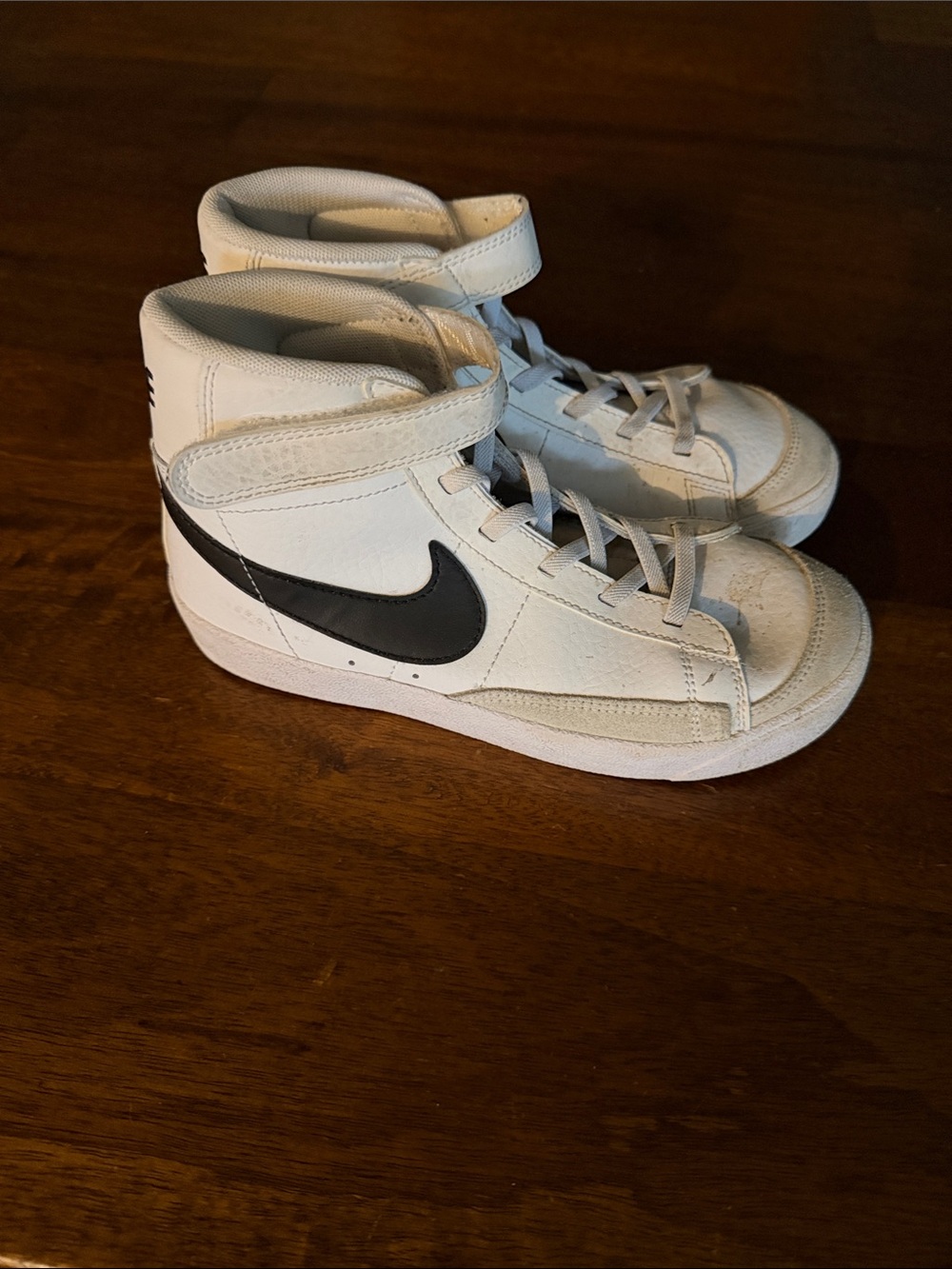 Nike Kids White High-Top Sneakers with Black Swoosh
